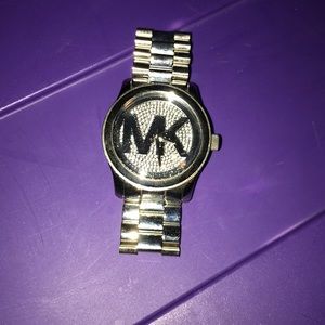 Silver MK watch